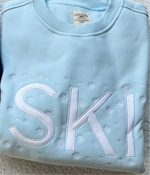 Icy Blue Ski Snowflake Sweatshirt: Clearwater Blue