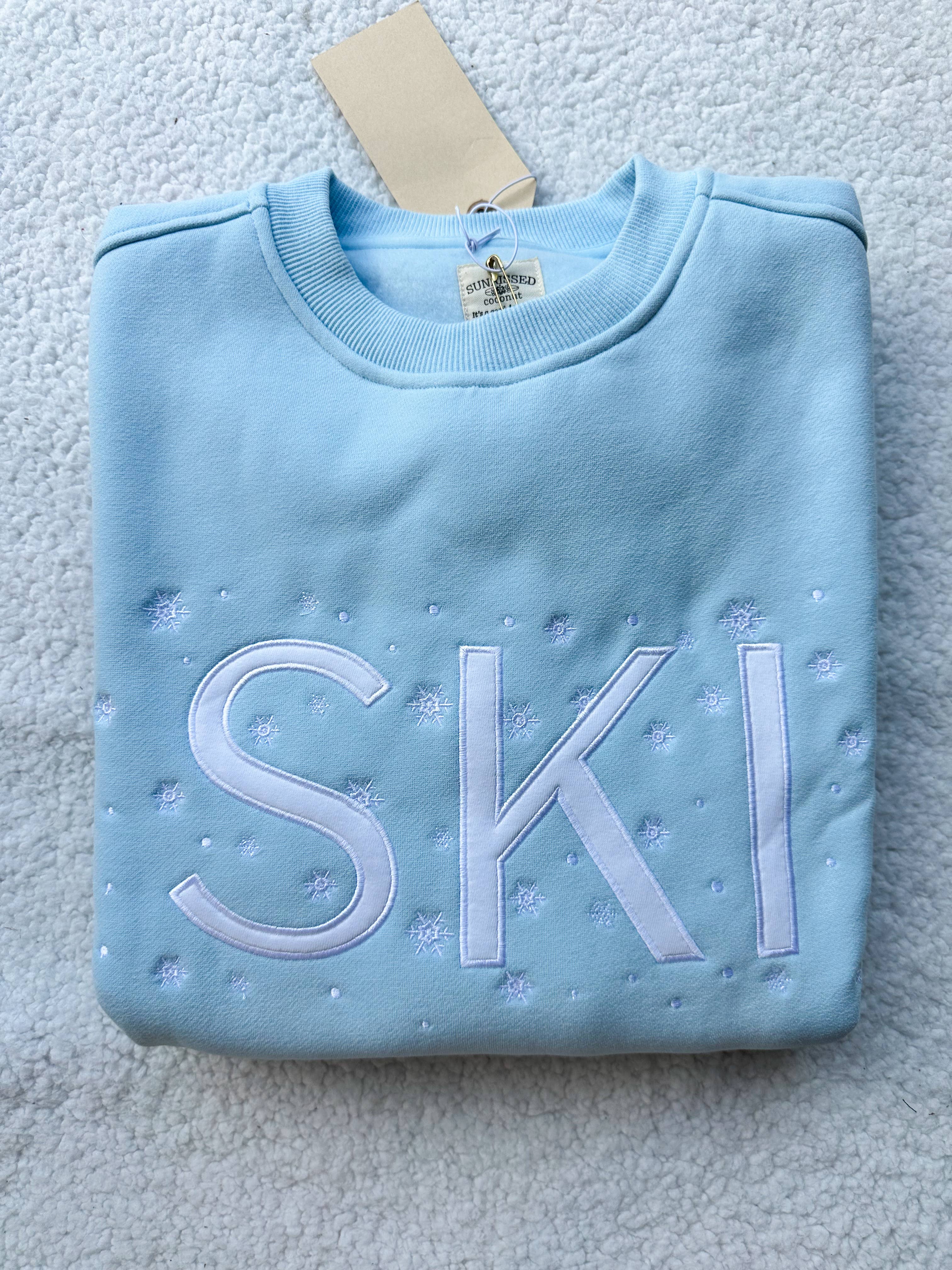 Icy Blue Ski Snowflake Sweatshirt: Clearwater Blue