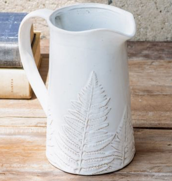 White embossed fern pitcher with reactive finish 8.75” high